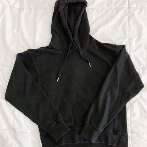 black hoodie with side pockets & drawstrings